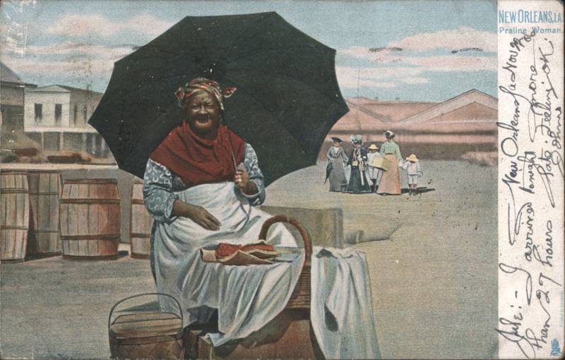 New Orleans, LA Praline Woman Under Umbrella with Baskets