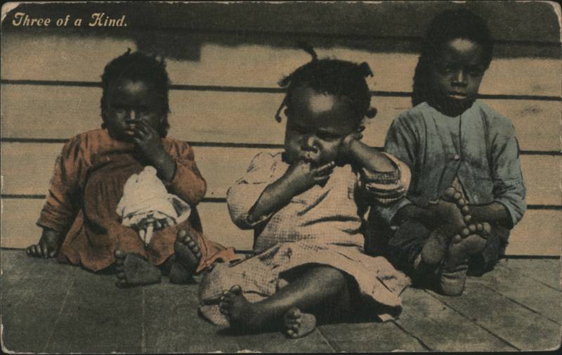 Three of a Kind Three African American Children Sitting