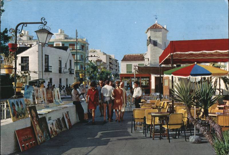 Calle de La Nogalera Street Scene with Art Displays
