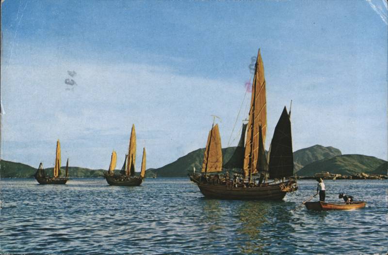 Traditional Chinese Fishing Junks Sailing in Coastal Waters