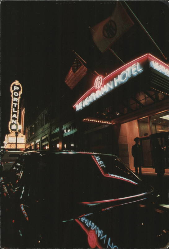 The Heathman Hotel and Portland Sign at Night