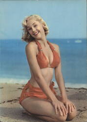 Smiling Blonde Pin-Up Model in Orange Bikini on Beach Postcard