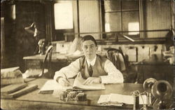 Businessman at Desk Old Phones Businessman at Desk Old Phones