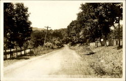 State Road Entering Village Postcard