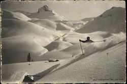Man skiing in Alpes Scenic, Switzerland Postcard Postcard