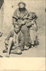 The poor woman with her children Postcard