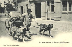Milkman with two dogs Postcard