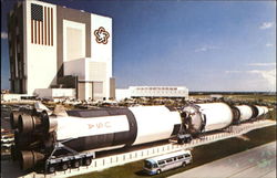 The Saturn V Rocket On Display Near Vehicle The Saturn V Rocket On Display Near Vehicle