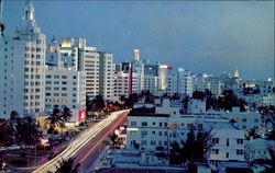 Night Scene Along Collins Avenue Miami Beach, FL Postcard Postcard
