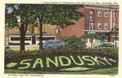 Floral Emblem in Washington Park and F.O.O.E. Bldg. Sandusky, OH Postcard Postcard