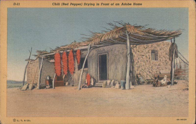 Chili (Red Pepper) Drying in Front of an Adobe Home