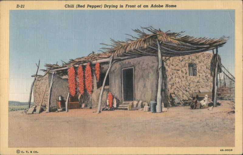 Chili (Red Pepper) Drying in Front of an Adobe Home