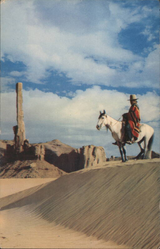 Totem Pole and Navajo Horseman, Monument Valley Arizona