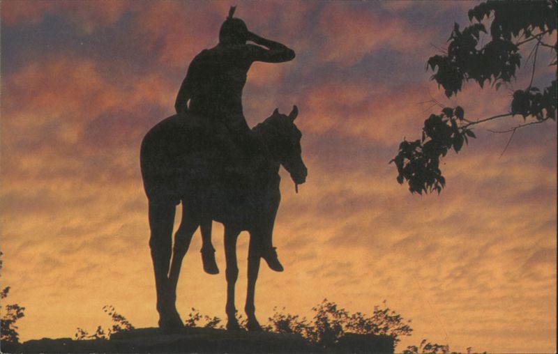 Silhouette of Native American on Horseback at Sunset