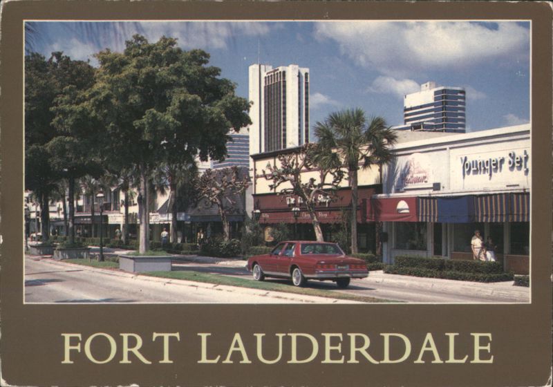 Fort Lauderdale Downtown Shopping Street with Red Car Florida