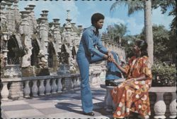 Couple at The Kapok Tree Inn Gardens, Clearwater, FL Postcard