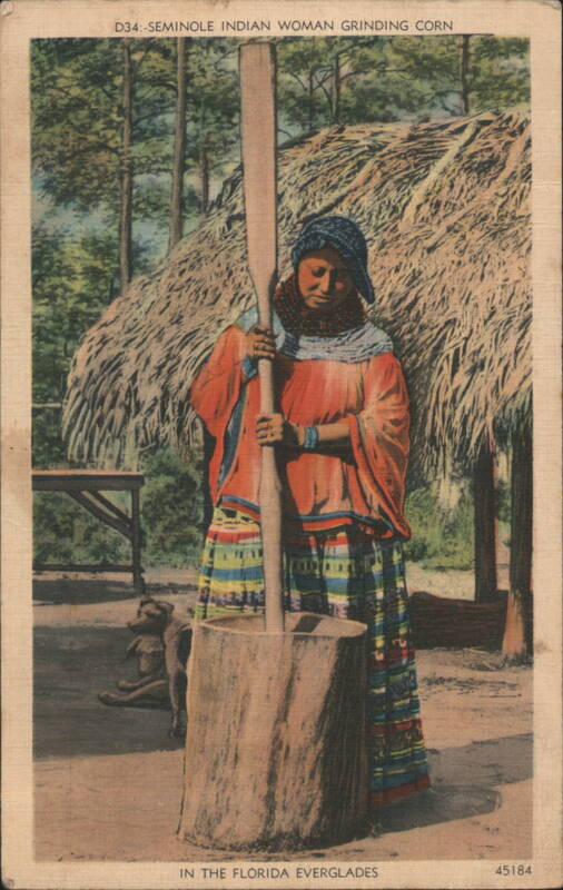 Seminole Woman Grinding Corn, Florida Everglades Chas. C. Ebbets