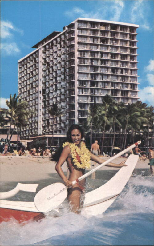 Outrigger Hotel Waikiki with Woman and Outrigger Canoe Honolulu Hawaii