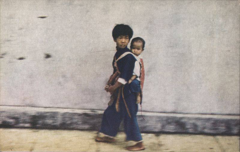 Chinese Boy Carrying Younger Child on Back China