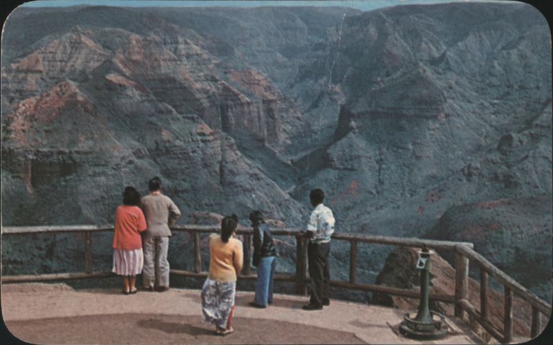 People viewing Waimea Canyon, Kauai from Puukapele Lookout Hawaii