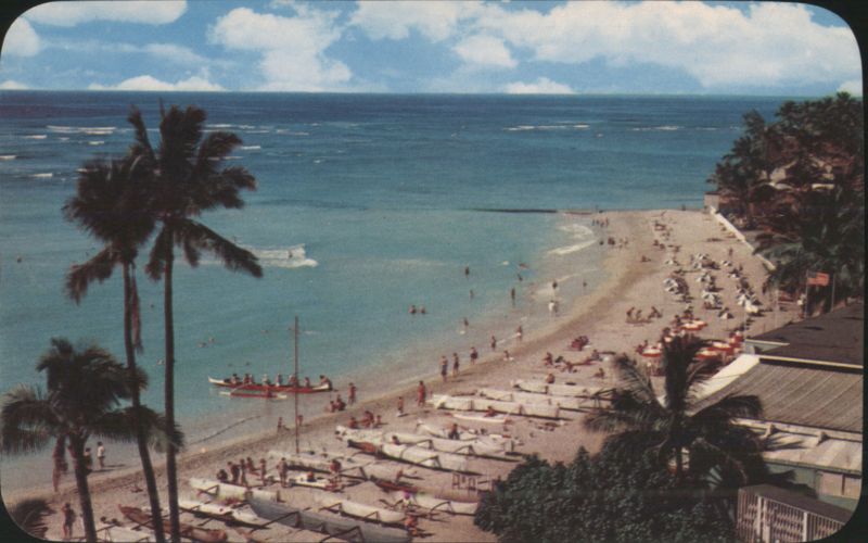 Waikiki Beach with Outrigger Canoes and Swimmers Honolulu Hawaii