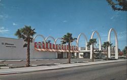 El Morocco Motor Hotel with Arched Facade and Striped Awning Postcard