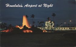 Honolulu's Airport at Night with Lava Rock Fountain Postcard