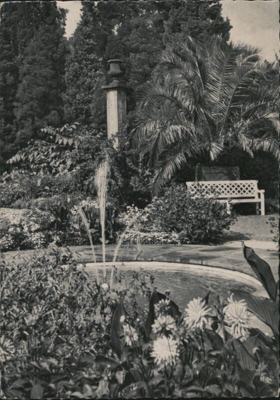 Palmgarten with Fountain and Bench in Spa Park Bad Pyrmont Germany
