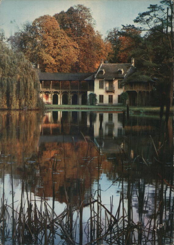 Petit Trianon, Queen's House reflected in pond Versailles France