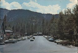 Main Street in Wrightwood, CA, with Mountain Backdrop Postcard
