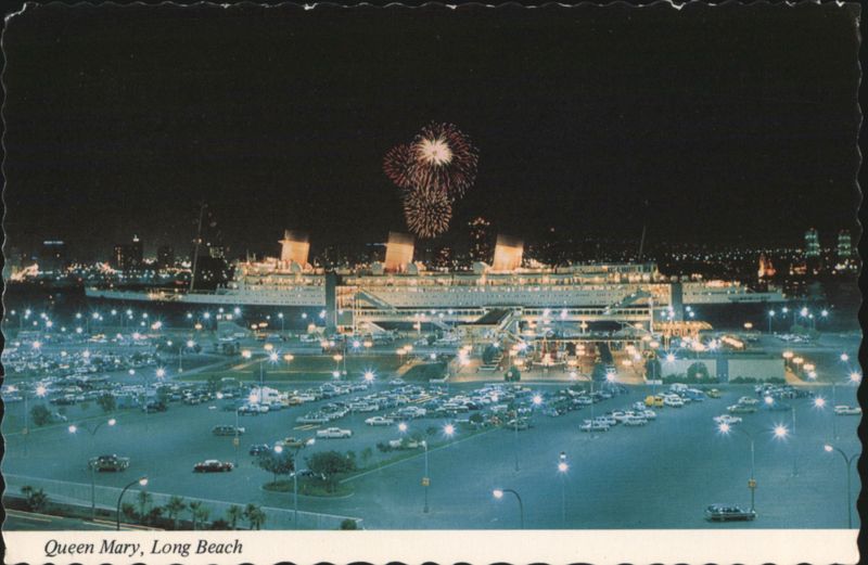 Queen Mary and Tour Plaza at night with fireworks Long Beach California