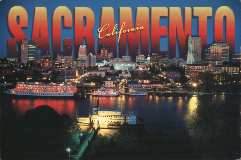 Sacramento California Night Skyline and Riverboats