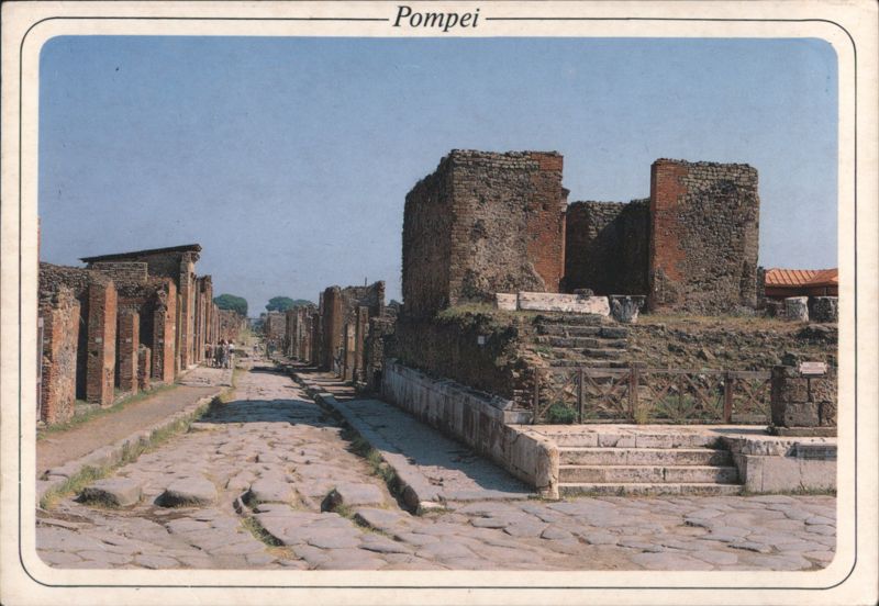 Ruins of Pompeii with Stepping Stones on Ancient Street Italy