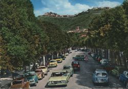 Tree-Lined Avenue and Hilltop Town in Montecatini Terme Postcard