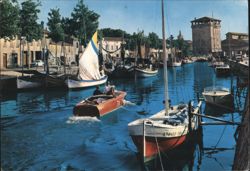 Boats on Canal in Cervia with Historic Tower Postcard