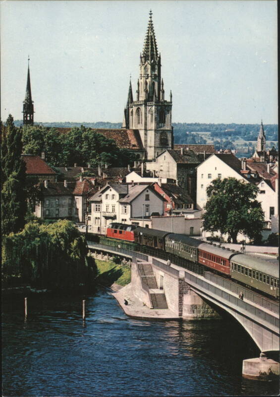 Constance: View over Rhine Bridge to Basilica with Train Konstanz Germany