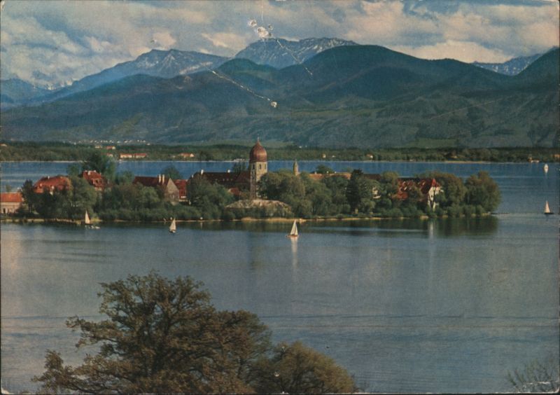 Fraueninsel in Chiemsee Lake with Bavarian Alps Prien Germany