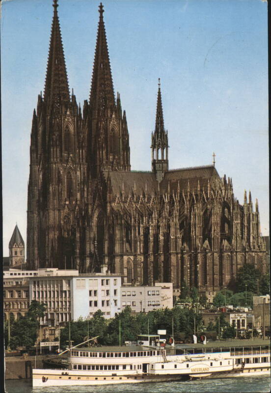 Cologne Cathedral and Rhine River with Passenger Boat Germany