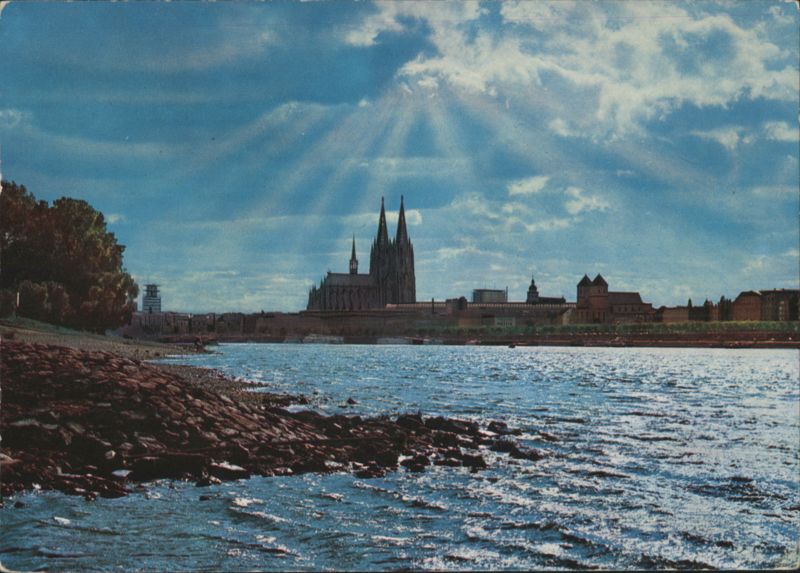 Cologne Cathedral on Rhine with Backlight and Sun Rays Germany
