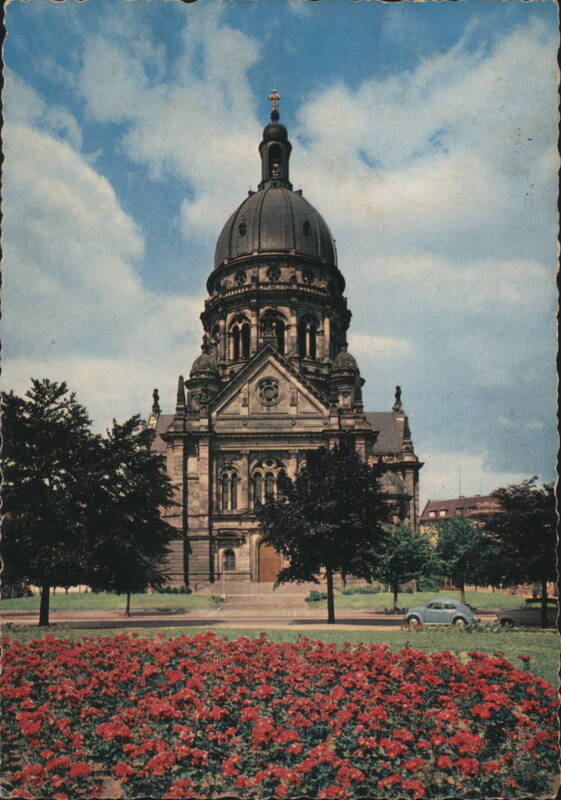 Christuskirche in Mainz with Red Flowers and Blue Sky Germany