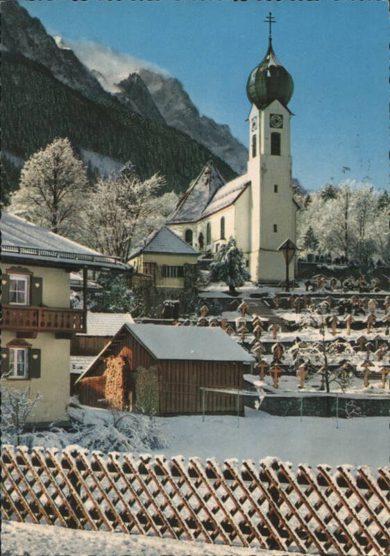 Pfarrkirche with Zugspitze in Winter, Grainau Germany