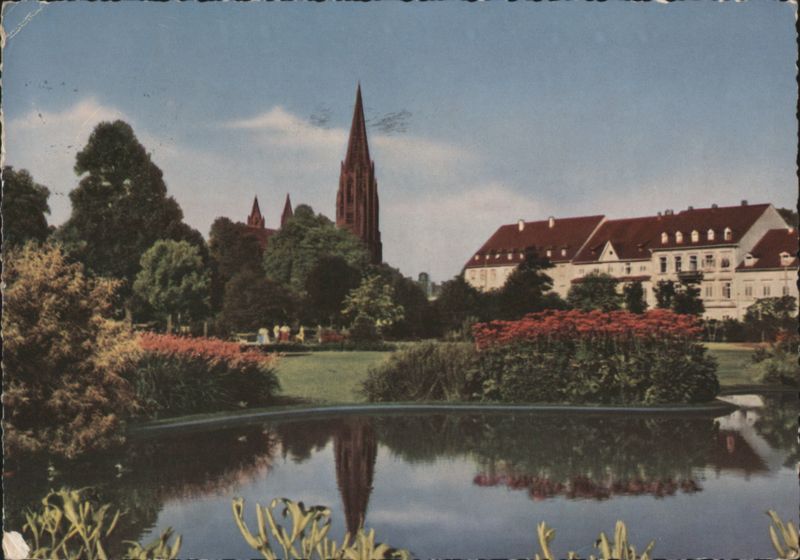 Freiburg Minster and Stadtgarten with Pond Germany