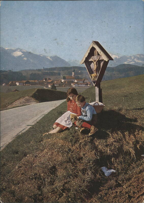 Children by a Wayside Cross with Alps in Vachendorf Germany