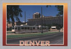 Denver Light Rail Train with City Buildings Postcard