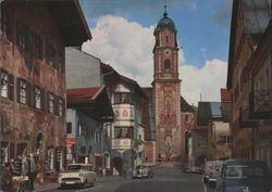 Mittenwald Obermarkt with Church Tower and Painted Buildings Postcard