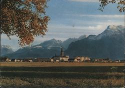 Church Steeple and Town with Alps in Freilassing, Germany Postcard