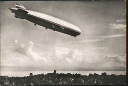 Graf Zeppelin Over Friedrichshafen Postcard