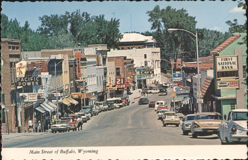 Main Street of Buffalo, Wyoming with Shops and Cars
