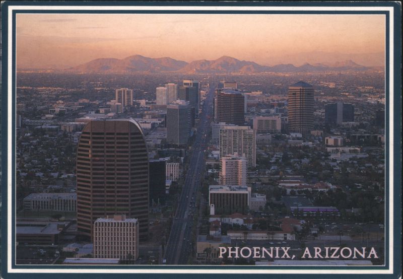 Phoenix, Arizona Cityscape and Mountains at Sunset