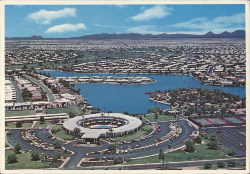 Aerial View of Sun City, Arizona with Circular Building and Lake